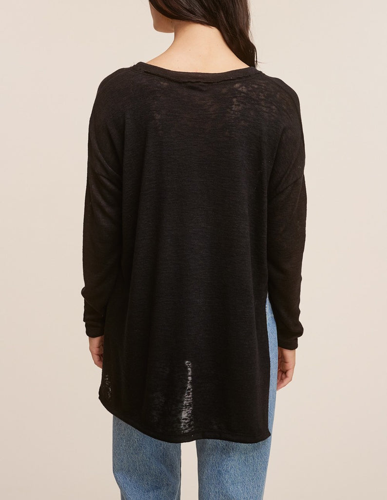 Raquel V-Neck Long Sleeve Top Black. This ultra lightweight long sleeve top features a v-neckline and side slit detail, the oversized fit make it perfect for throwing on with leggings for an easy outfit.