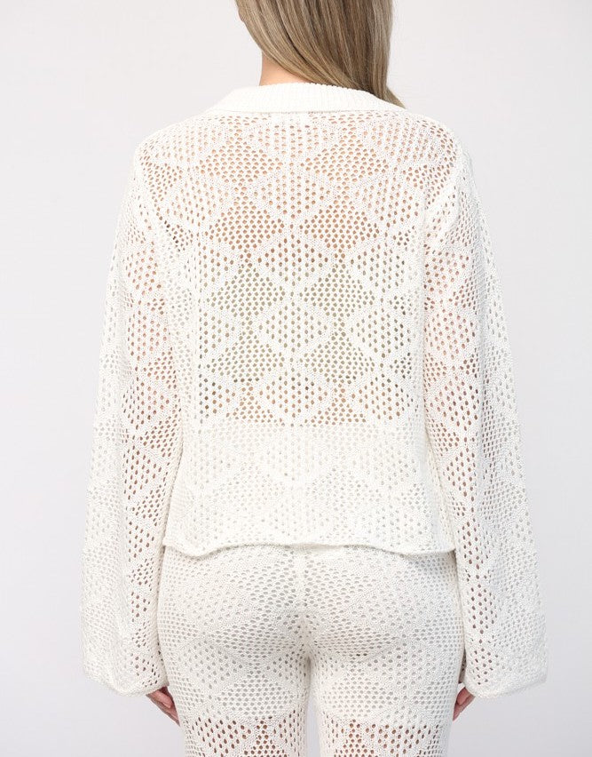 Fate Diamond Crochet Top Off White. This long sleeve crochet top features a diamond knit design with a button down front that allows it to be worn closed or open for a boho chic layered look.