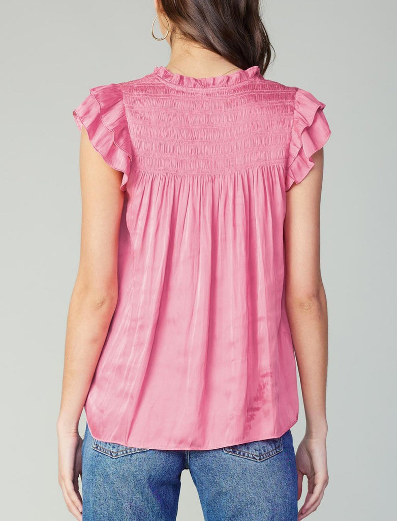 Current Air Smocked Back Blouse Pink. This split-neck blouse has an airy feel and details you'll love, a smocked back, ruffle trim, and fluttery short sleeves. The dainty tie at the neckline adds a feminine finish.