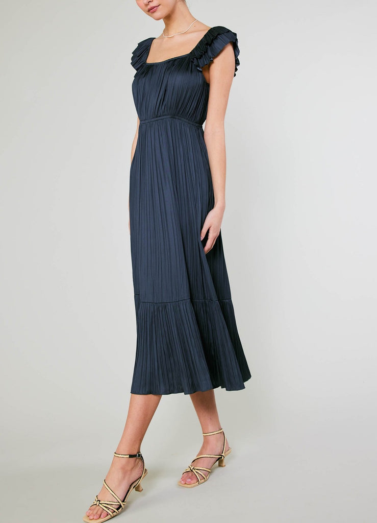 Current Air Pleated Square Neck Dress Navy. This pretty midi dress features a square neckline with pleated fabric and flutter short sleeves, the perfect dress to wear day or night anytime of year.