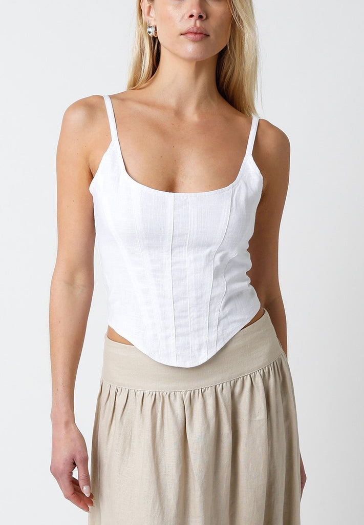 Ladonna Corset Bodice Tank White. This sleeveless corset style top features a square neckline with a zip close back and curved hem, dress it up with a skirt and heels or down with sneakers and jeans.