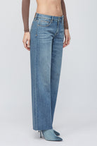 Hidden Logan Low Rise Dad Jean Medium Blue. Get the 90s look in these low rise dad jeans, made from super soft denim, they're the perfect pair to throw on for a casual cool girl vibe.
