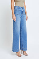 Hidden Nori Wide Leg Jean Medium Blue. These trendy wide leg jeans feature front patch pockets and a high rise, the perfect pair for making a statement that can be dressed up or down.