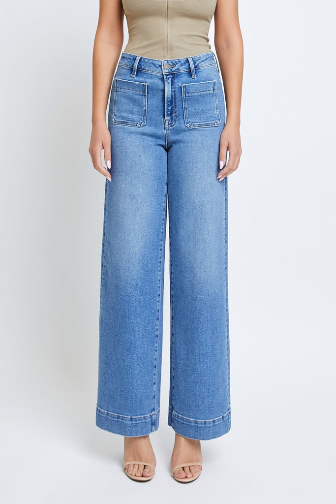Hidden Nori Wide Leg Jean Medium Blue. These trendy wide leg jeans feature front patch pockets and a high rise, the perfect pair for making a statement that can be dressed up or down.