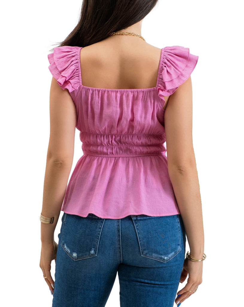 Yuliana Ruffle Sleeve Blouse Pink. This pretty ruffle sleeve blouse features a sweetheart neckline with a shirred waist and lightweight fabric that's perfect for the spring and summer with jeans or shorts.