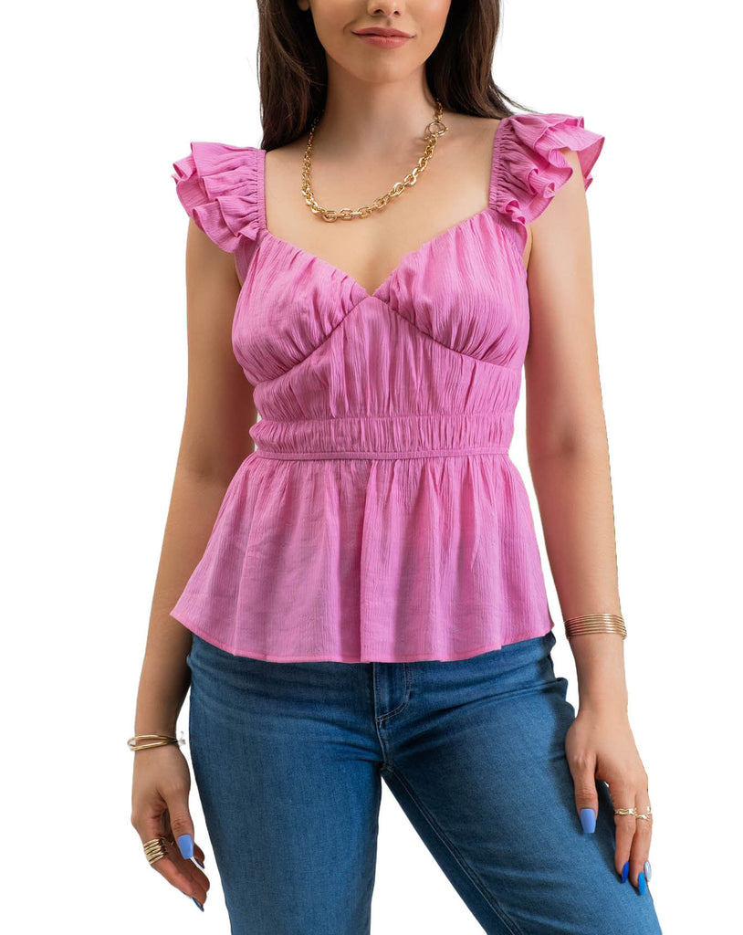Yuliana Ruffle Sleeve Blouse Pink. This pretty ruffle sleeve blouse features a sweetheart neckline with a shirred waist and lightweight fabric that's perfect for the spring and summer with jeans or shorts.