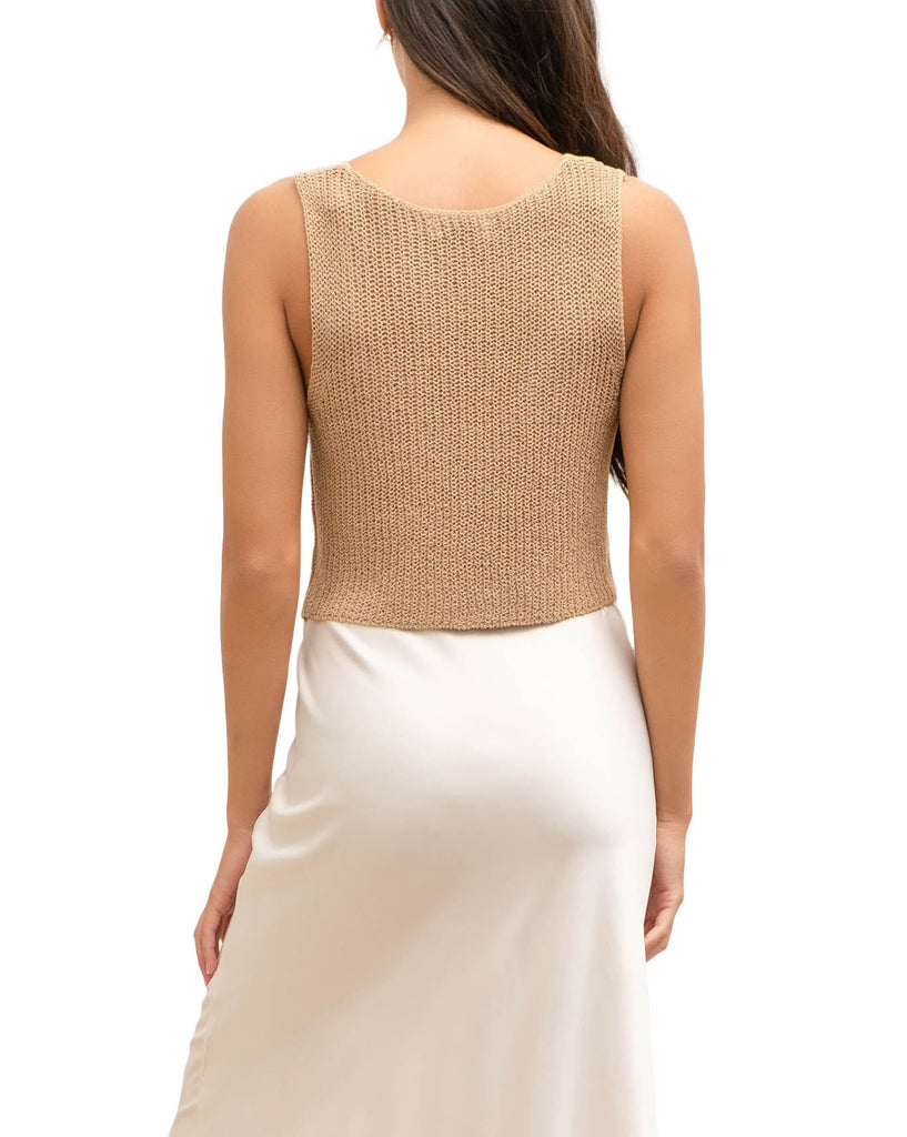 Brooklyn Hook & Eye Knit Vest Tan. This knit vest features a sleeveless design with hook and eye closures and v-neckline, wear it on its own for a bare look or layer it over your favorite tank or tee.