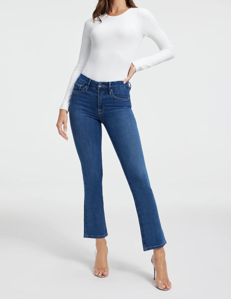 Good American Straight Leg Jeans Blue. The ultimate sculpting jeans, featuring an iconic straight leg fit, these are the body-hugging, booty shaping jeans of your dreams featuring a mid-rise and clean design.