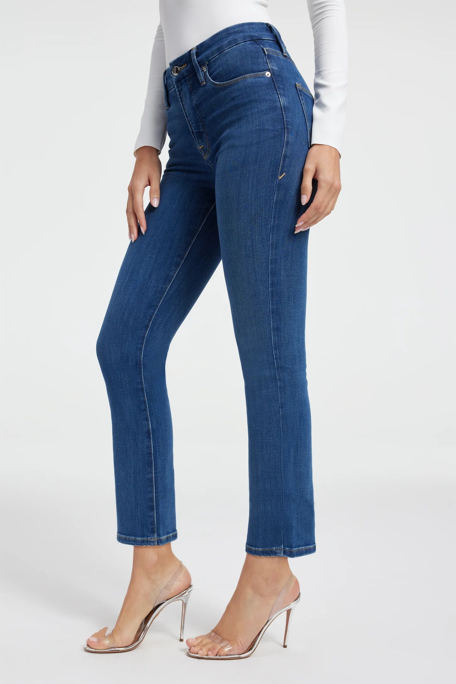 Good American Straight Leg Jeans Blue. The ultimate sculpting jeans, featuring an iconic straight leg fit, these are the body-hugging, booty shaping jeans of your dreams featuring a mid-rise and clean design.