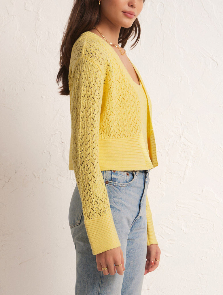 Z Supply Kapa Cardigan Pina Colada. Cute and cropped, you're gonna love the Kapa Cardigan. The elevated design and texture of this sweater cardi is perfect for throwing on over a tank with denim.