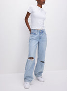 Good American 90s Jeans Blue. These iconic ‘90s inspired relaxed jeans feature a loose straight leg design, distressed knees and a rigid denim for the perfect vintage look.