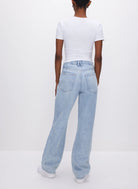 Good American 90s Jeans Blue. These iconic ‘90s inspired relaxed jeans feature a loose straight leg design, distressed knees and a rigid denim for the perfect vintage look.
