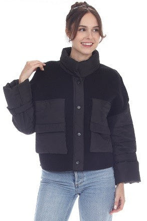 black cropped puffer, utility jacket, mixed media outerwear, winter layering piece, modern quilted jacket, street style outerwear.