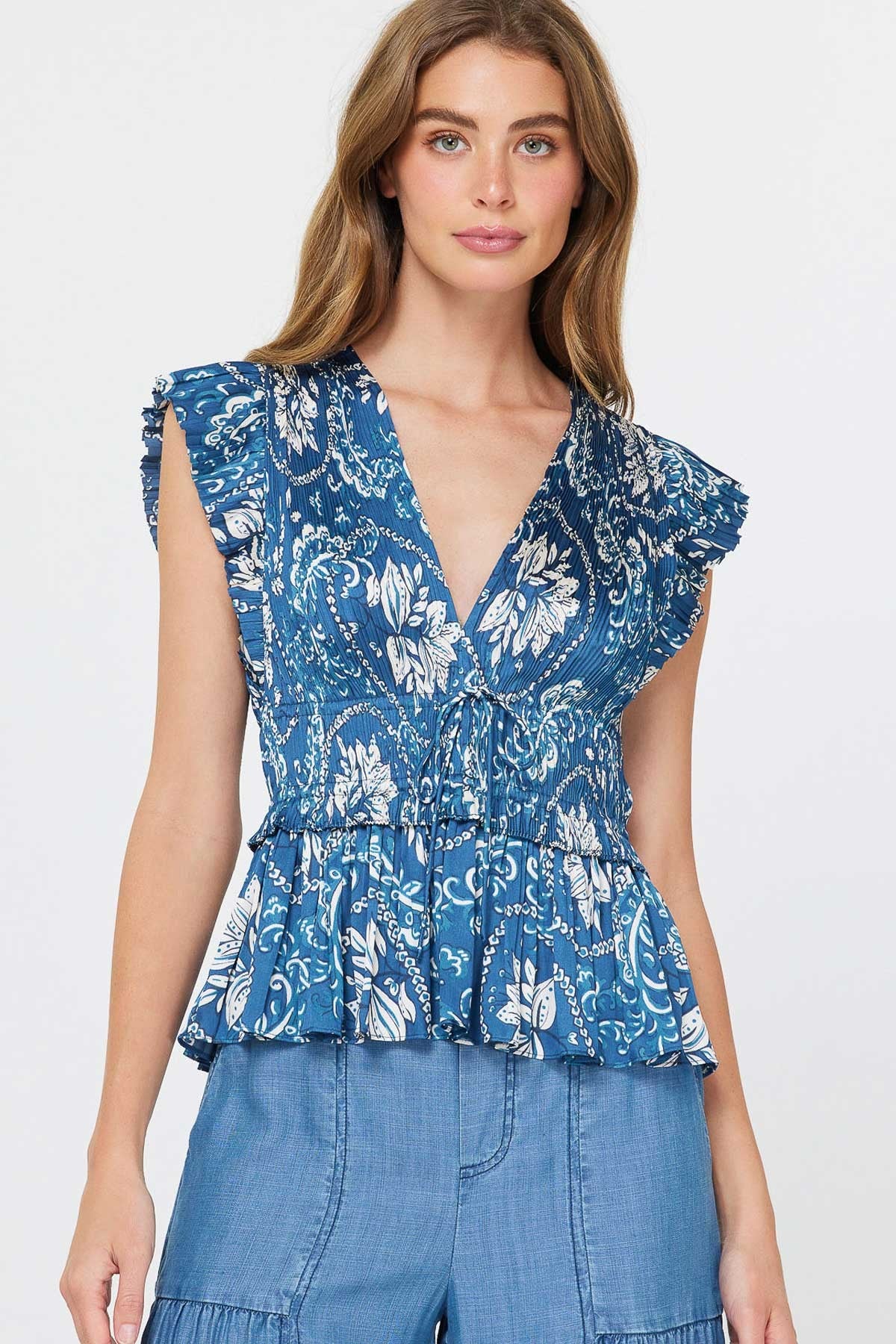 blue and white floral v-neck blouse