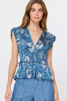 blue and white floral v-neck blouse