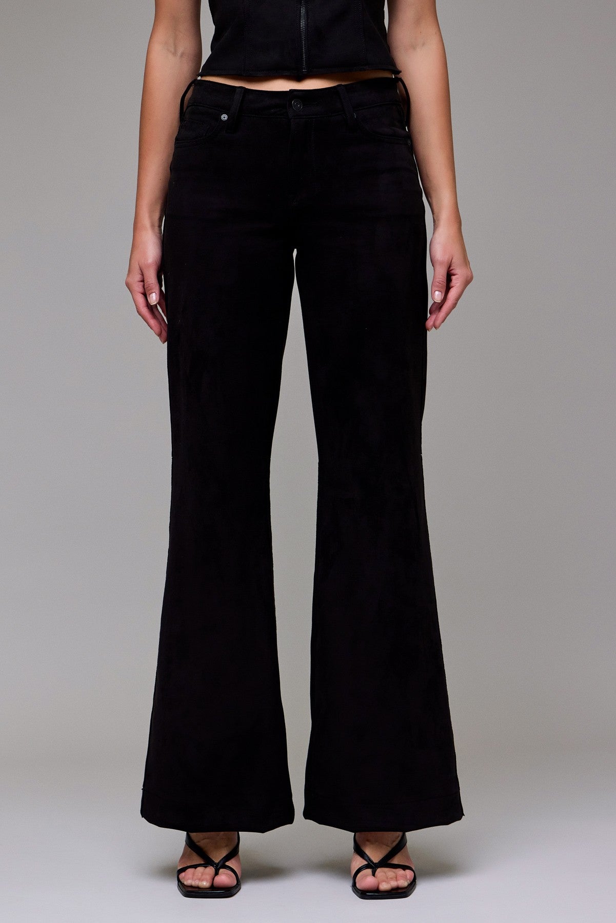 black faux suede pants, suede flare pants, high rise black pants, flared suede trousers, women’s black flares, soft suede bottoms, chic black pants, fall outfit pants, black suede bell bottoms, dressy flare pants women, modern suede look, night out outfit pants