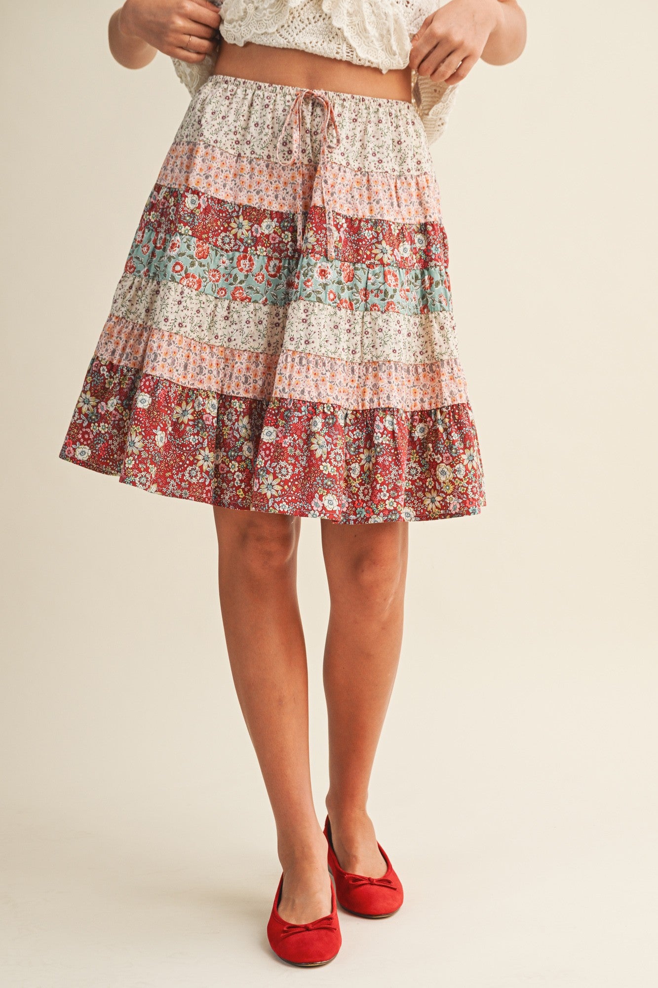 patchwork mini skirt, tiered mini skirt, floral mini skirt, boho mini skirt, elastic waist skirt, drawstring skirt, casual skirt, boutique skirt, everyday mini skirt, flowy mini skirt, women’s mini skirt, summer skirt, boho boutique skirt