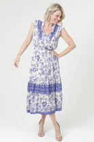Printed midi dress with ruffle sleeves, a drawstring waist, and a flowy skirt.