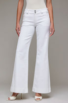 High-rise wide leg pants with full length silhouette styled with heels