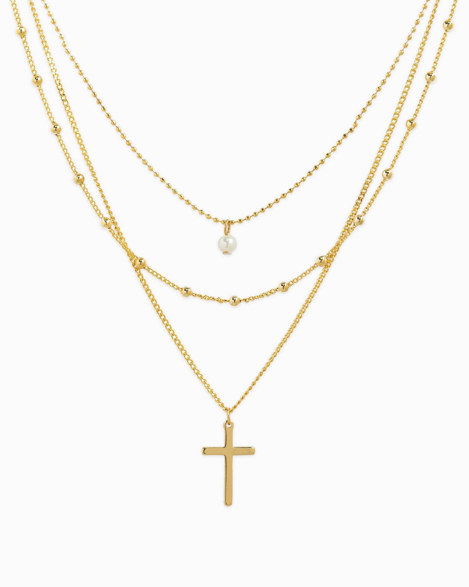 layered cross necklace, gold layered necklace, cross pendant necklace, dainty gold necklace set, pearl accent necklace, women’s layered jewelry, delicate gold necklace, boutique jewelry necklace, minimalist cross necklace, everyday gold jewelry