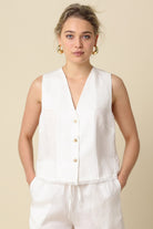 sleeveless button front top, women's sleeveless blouse, lightweight summer top, v neck sleeveless top, casual chic blouse, women's everyday top, minimalist sleeveless top, relaxed fit blouse, breathable summer blouse, women's modern basics, effortless everyday top, elevated casual top, button front blouse, women's versatile top, chic layering blouse
