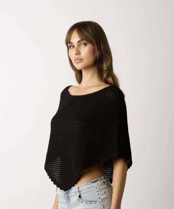 Moonbeam Short Boat Neck Poncho Sweater in Black, side view