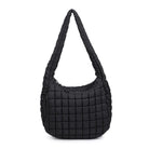 Sol & Selene Revive Tote Black. Revive your style with the Revive Tote. Crafted with utmost attention to detail, this chic and versatile bag combines functionality with a trendy design. Elevate your look and carry all your essentials in style with this must-have bag.