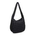 Sol & Selene Revive Tote Black. Revive your style with the Revive Tote. Crafted with utmost attention to detail, this chic and versatile bag combines functionality with a trendy design. Elevate your look and carry all your essentials in style with this must-have bag.