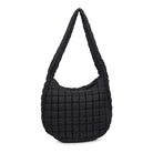 Sol & Selene Revive Tote Black. Revive your style with the Revive Tote. Crafted with utmost attention to detail, this chic and versatile bag combines functionality with a trendy design. Elevate your look and carry all your essentials in style with this must-have bag.