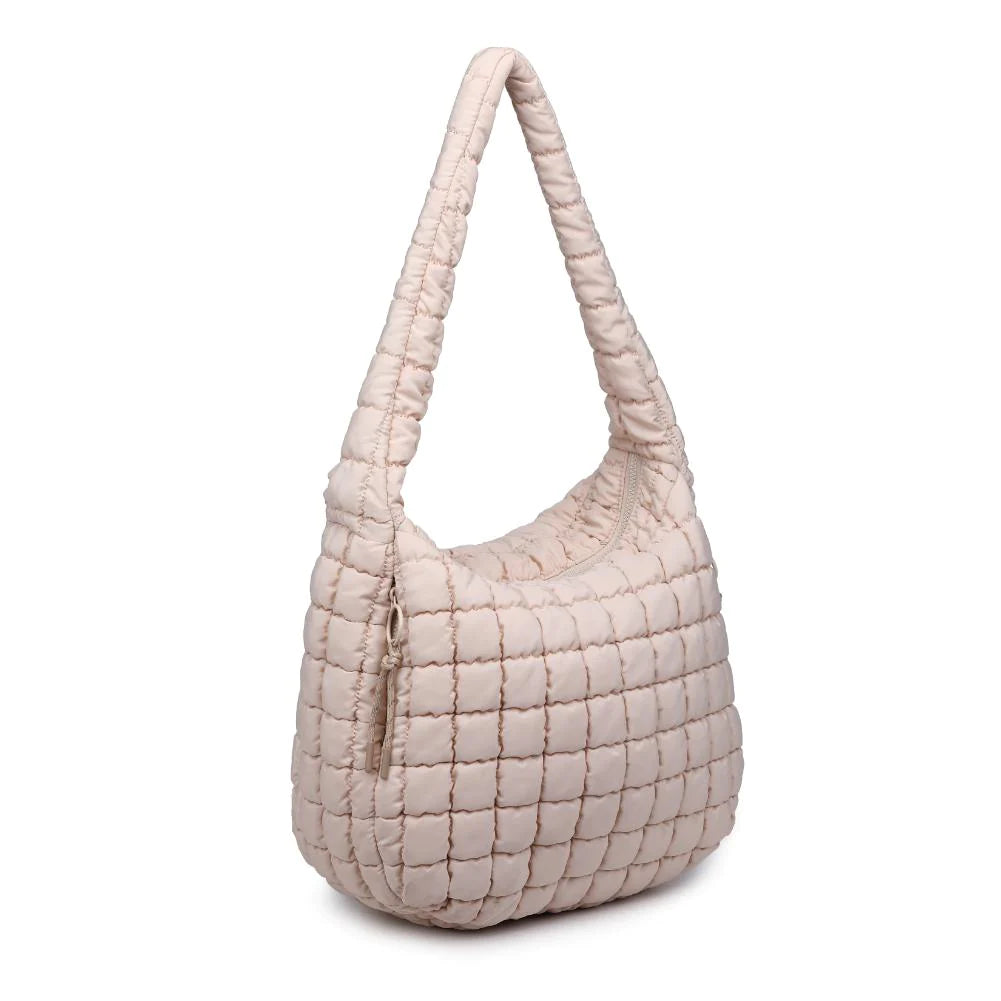 Sol & Selene Revive Tote Cream. Revive your style with the Revive Tote. Crafted with utmost attention to detail, this chic and versatile bag combines functionality with a trendy design. Elevate your look and carry all your essentials in style with this must-have bag.