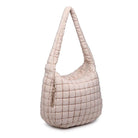 Sol & Selene Revive Tote Cream. Revive your style with the Revive Tote. Crafted with utmost attention to detail, this chic and versatile bag combines functionality with a trendy design. Elevate your look and carry all your essentials in style with this must-have bag.