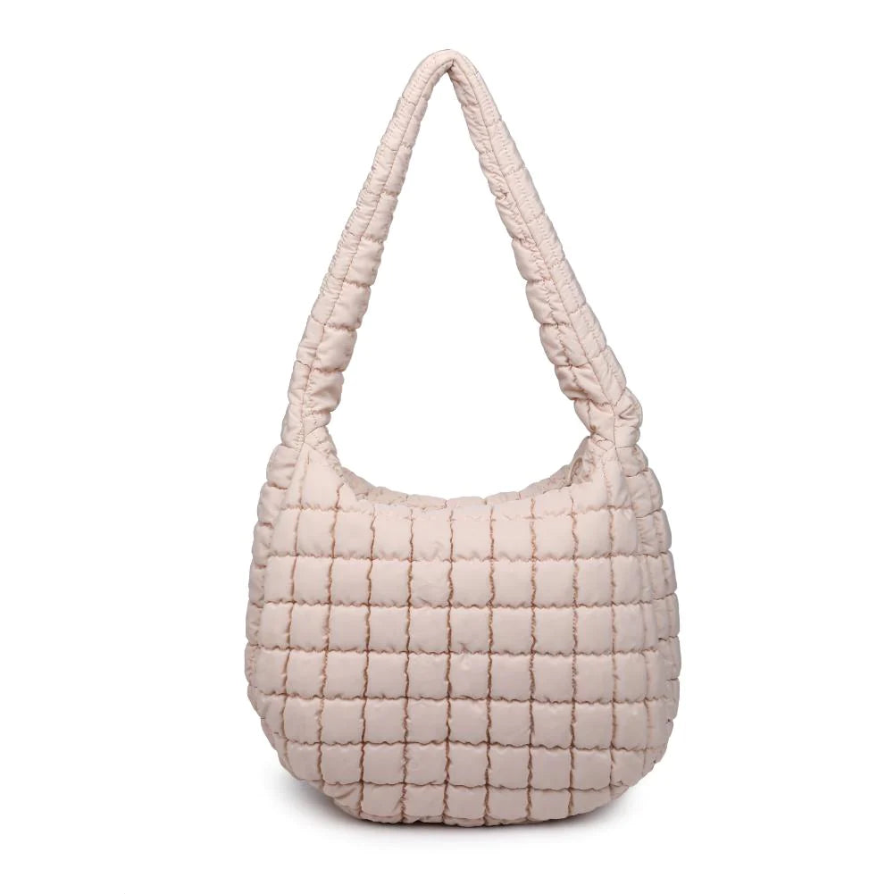 Sol & Selene Revive Tote Cream. Revive your style with the Revive Tote. Crafted with utmost attention to detail, this chic and versatile bag combines functionality with a trendy design. Elevate your look and carry all your essentials in style with this must-have bag.
