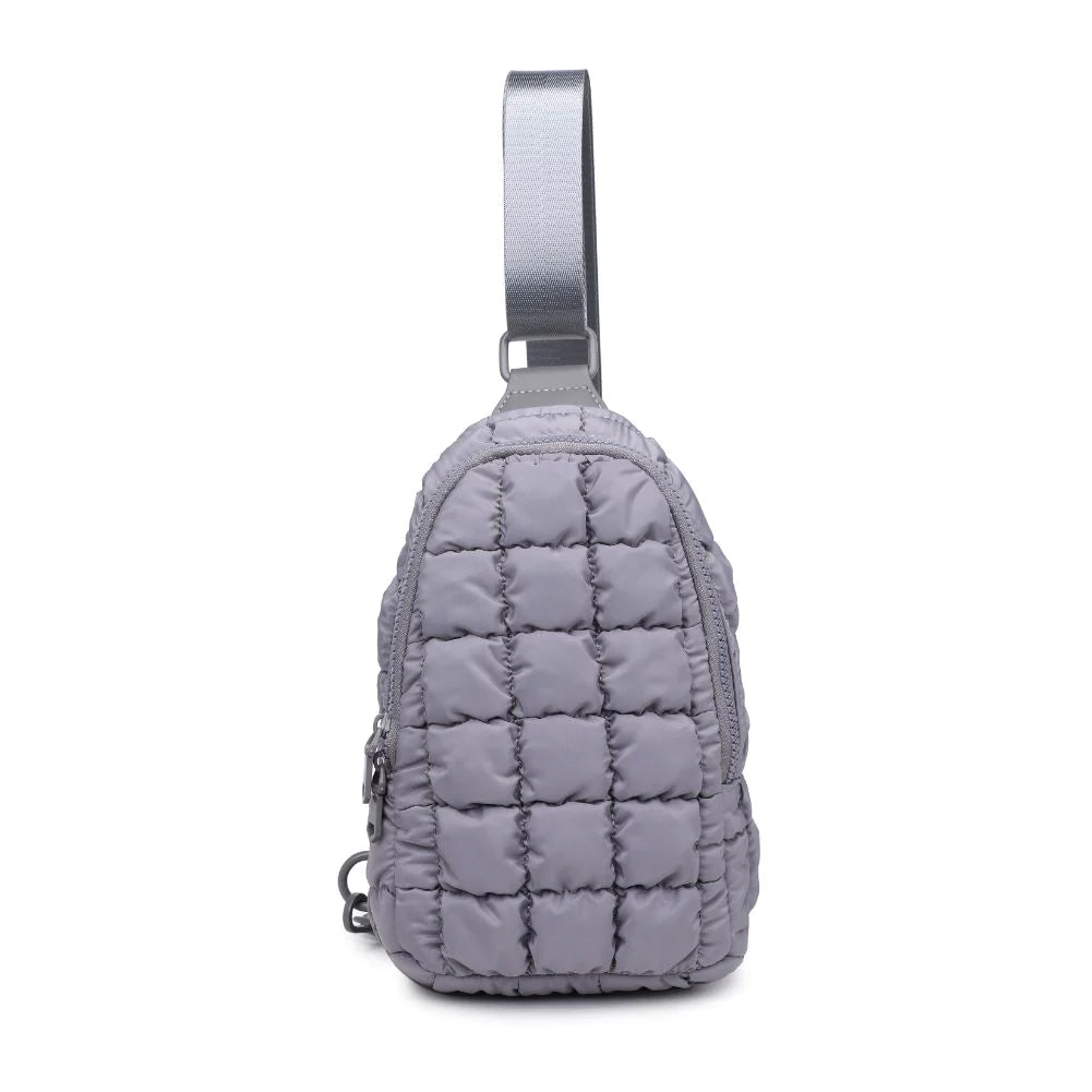 Sol and Selene Rejuvenate Sling Backpack Grey. The fashion-forward companion that fits right into your athleisure aesthetic. This nifty nylon number, showcasing a quilted design, packs style, and functionality into one neat, zippered package. So, you carry the essentials hands-free while looking effortlessly cool.