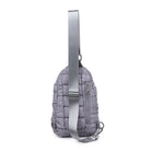 Sol and Selene Rejuvenate Sling Backpack Grey. The fashion-forward companion that fits right into your athleisure aesthetic. This nifty nylon number, showcasing a quilted design, packs style, and functionality into one neat, zippered package. So, you carry the essentials hands-free while looking effortlessly cool.