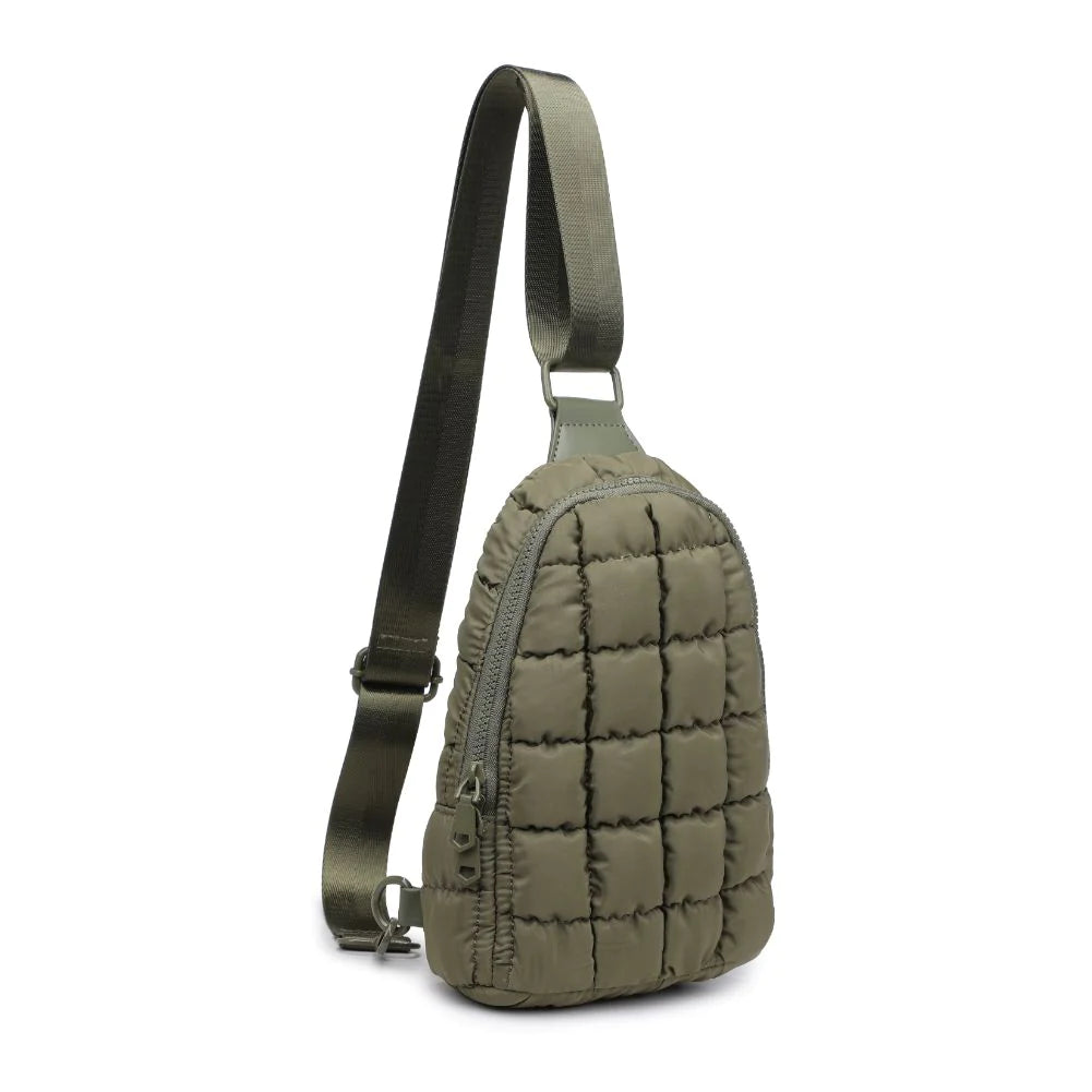Sol and Selene Rejuvenate Sling Backpack Olive. The fashion-forward companion that fits right into your athleisure aesthetic. This nifty nylon number, showcasing a quilted design, packs style, and functionality into one neat, zippered package. So, you carry the essentials hands-free while looking effortlessly cool.