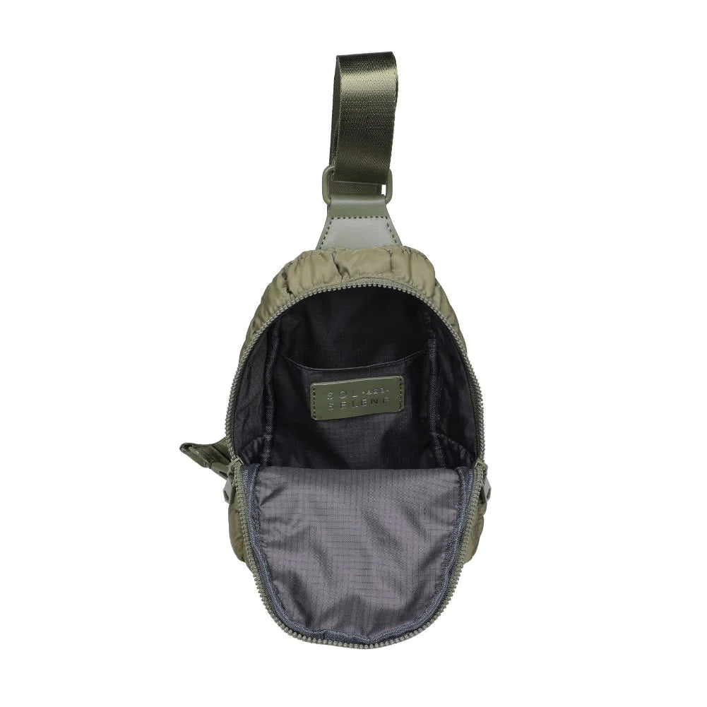 Sol and Selene Rejuvenate Sling Backpack Olive. The fashion-forward companion that fits right into your athleisure aesthetic. This nifty nylon number, showcasing a quilted design, packs style, and functionality into one neat, zippered package. So, you carry the essentials hands-free while looking effortlessly cool.