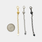 OMG blings Magnetic Extender in Gold, shown with coin for scale