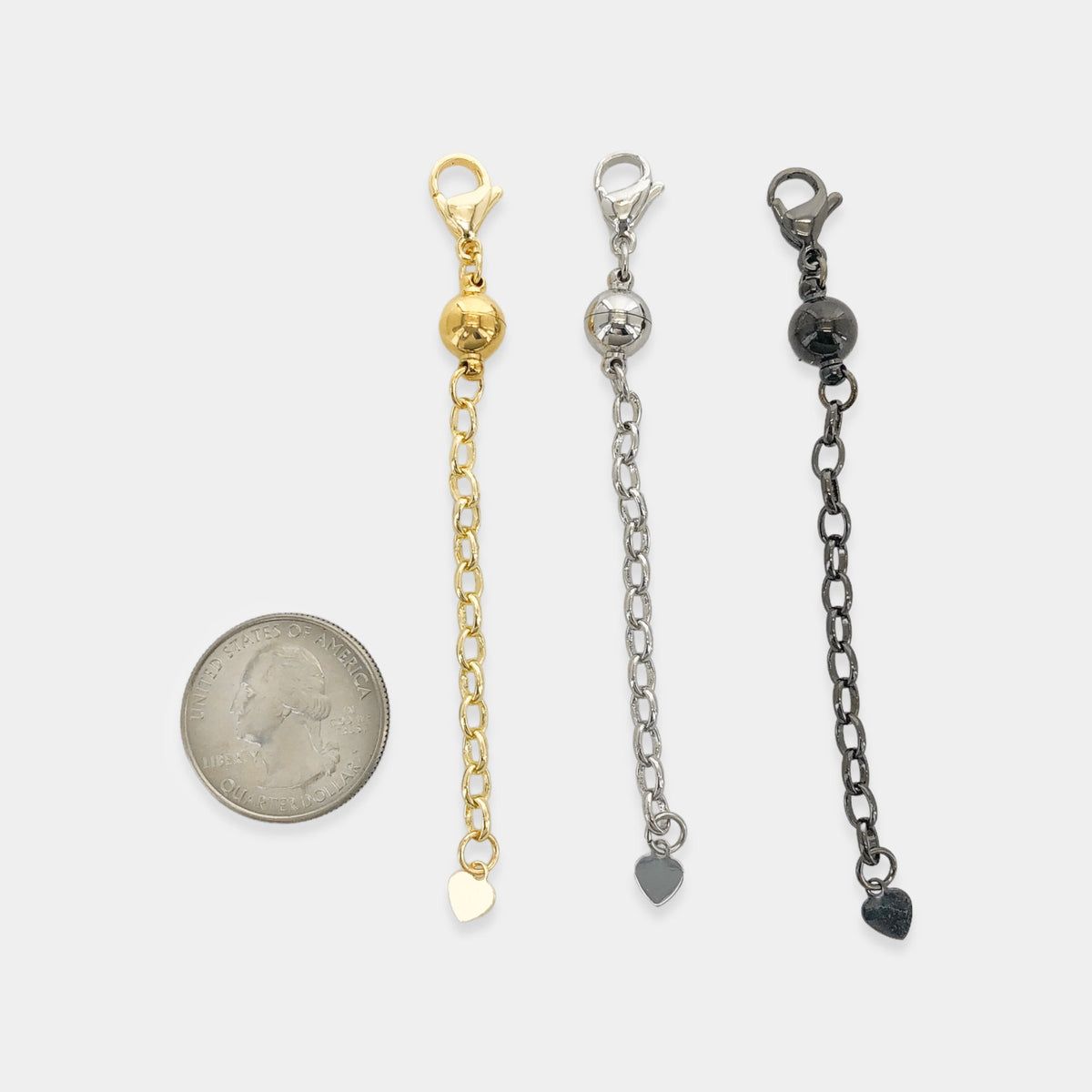OMG blings Magnetic Extender in Gold, shown with coin for scale