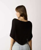 Moonbeam Short Boat Neck Poncho Sweater in Black, back view