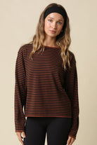  Striped knit crewneck top with long sleeves and a relaxed fit.