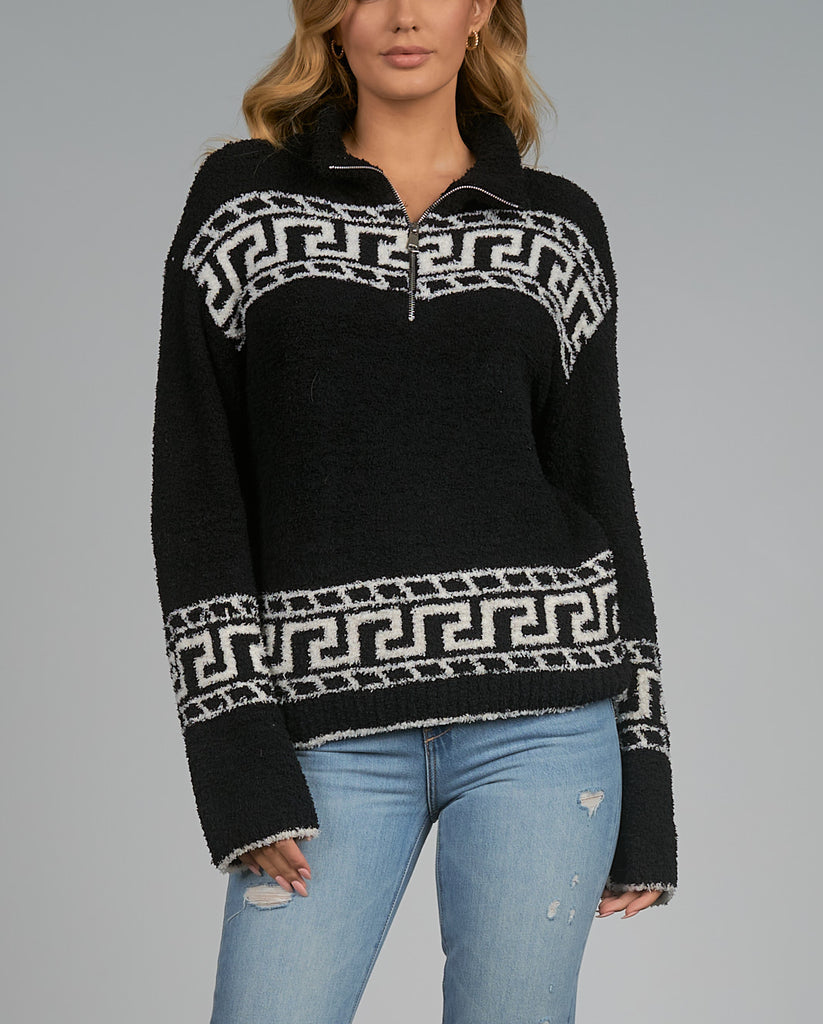 Elan Cozy Zip Sweater Black/Off White. This sweater is made out of the softest plush material for a cozy feel you'll never want to take off, featuring a zip front that can be worn up or down.