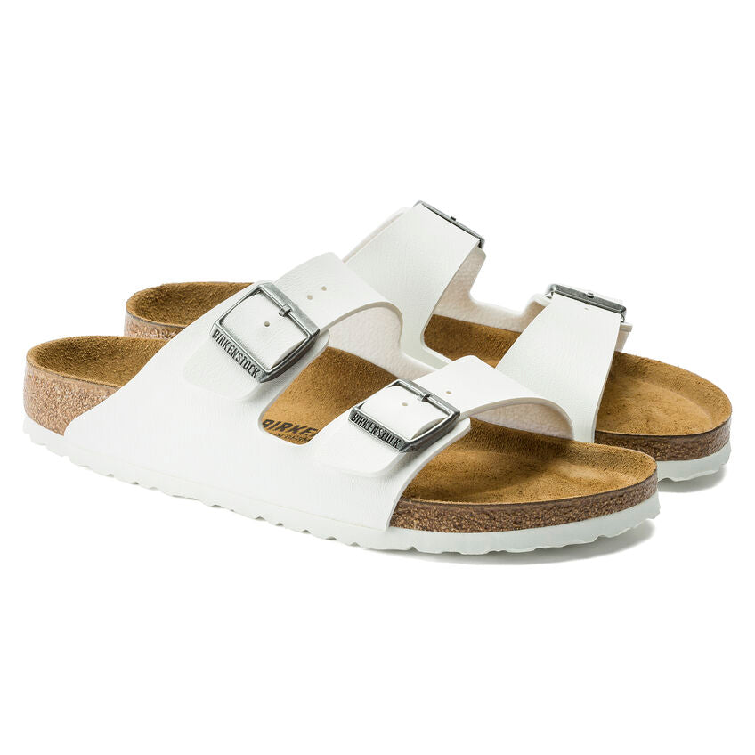 Birkenstock Arizona Birko-Flor White. An icon of timeless design and legendary comfort, the Arizona sandal comes in durable Birko-Flor for a classic, leather-like finish. Complete with signature design elements, like a contoured cork-latex footbed for the ultimate in support.