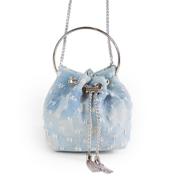 Denim Bucket Hat Faded Wash. This adorable denim bucket bag is one of a kind with a metal loop handle as well as a crossbody chain so you can style it however you want day or night.