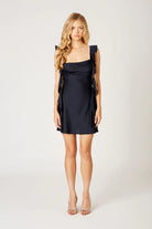 Mini dress with draped neckline and ruffle straps