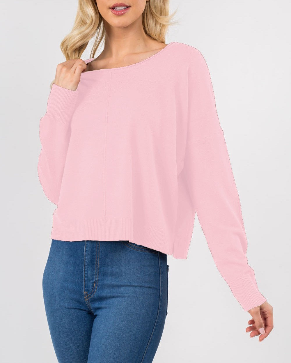 Eliza Front Seam Pullover Pink Lemonade. This round neck pullover features a front seam and fitted design, the perfect lightweight everyday sweater to have in your closet for any time of year.