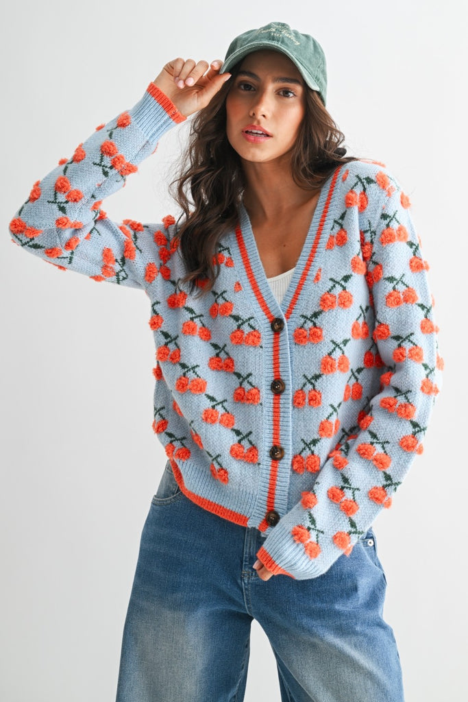 cherry cardigan, printed cardigan sweater, button front cardigan, women’s knit sweater, statement cardigan, boutique sweater, cozy cardigan, fall layering sweater, playful knitwear