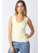 ribbed tank top, fitted scoop neck tank, everyday layering tank, essential basic tank top, fitted knit tank, minimalist wardrobe staple, casual layering top, women's everyday tank, versatile basic top, stretch ribbed tank, capsule wardrobe essential, modern basic top, casual fitted sleeveless top, boutique fashion basics
