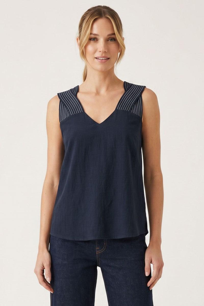 Sleeveless V-neck top with contrast stitched shoulder detailing and relaxed fit.