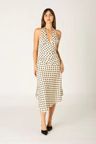 Polka dot midi dress with halter neckline and draped front