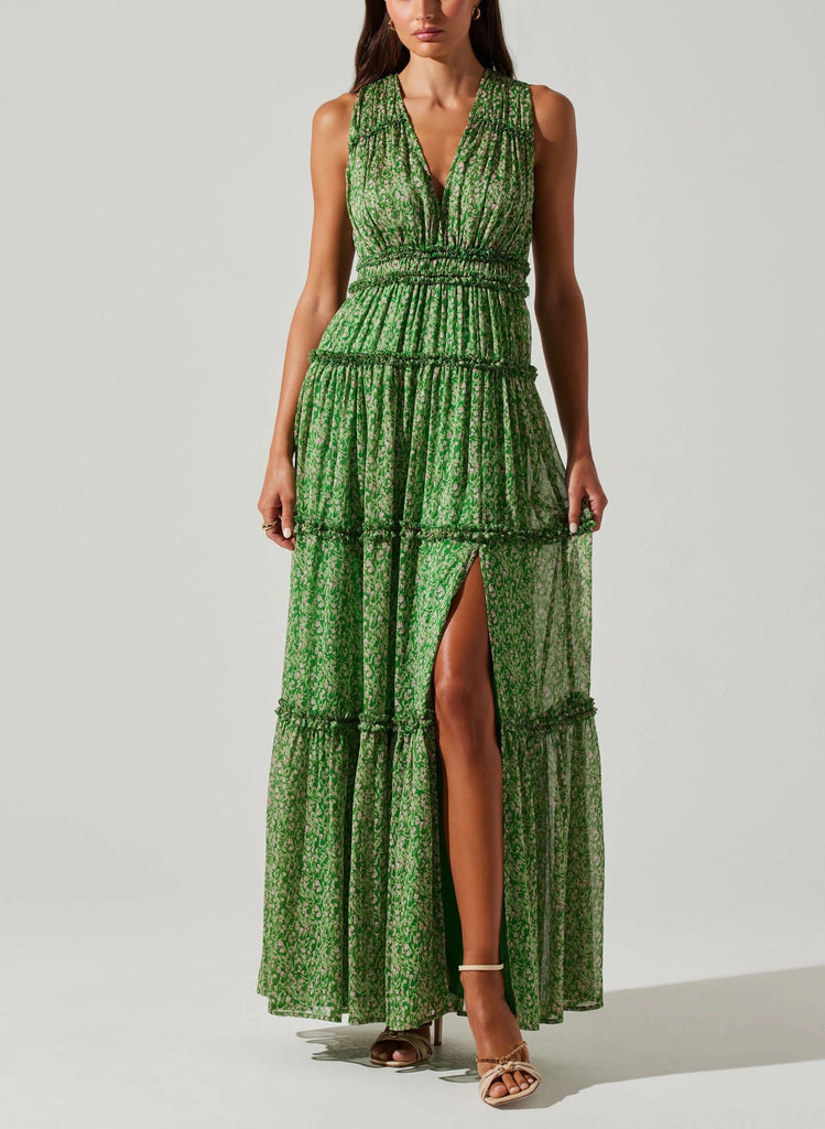 ASTR Edessa Dress Green Pink Floral. This tiered maxi dress features a floral print, exaggerated slit above the knee and a hook closure at the bodice with adjustable tie back closure, the perfect statement dress for spring.